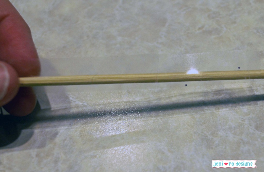 wrap skewer with double stick tape